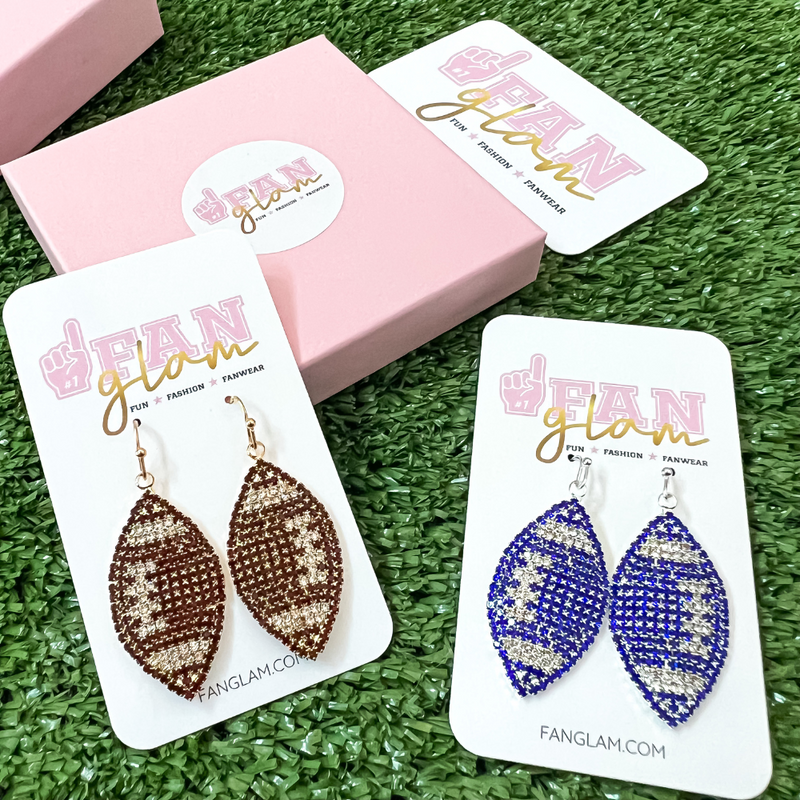 Show your love for the game when accessorizing your Game Day look with these one-of-a-kind micro pave rhinestoned football stud dangle earrings!   The perfect accessory to get you fired up for the playoffs this season!