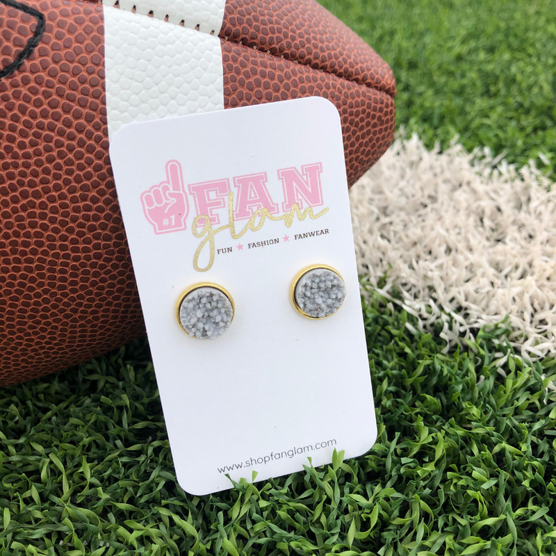 Our GameDay Circle Stud Earrings are the perfect pop of color for game time and a fun substitute for your everyday earrings!  Available in ten bright colors, it's easy to mix and match all your favorite teams!