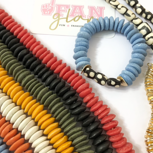 Excited to introduce a new and unique glass bead to our GameDay stack line up!  Help us give a big welcome to our Ashanti Glass Bead Stretch Bracelet as it hits the field this season!