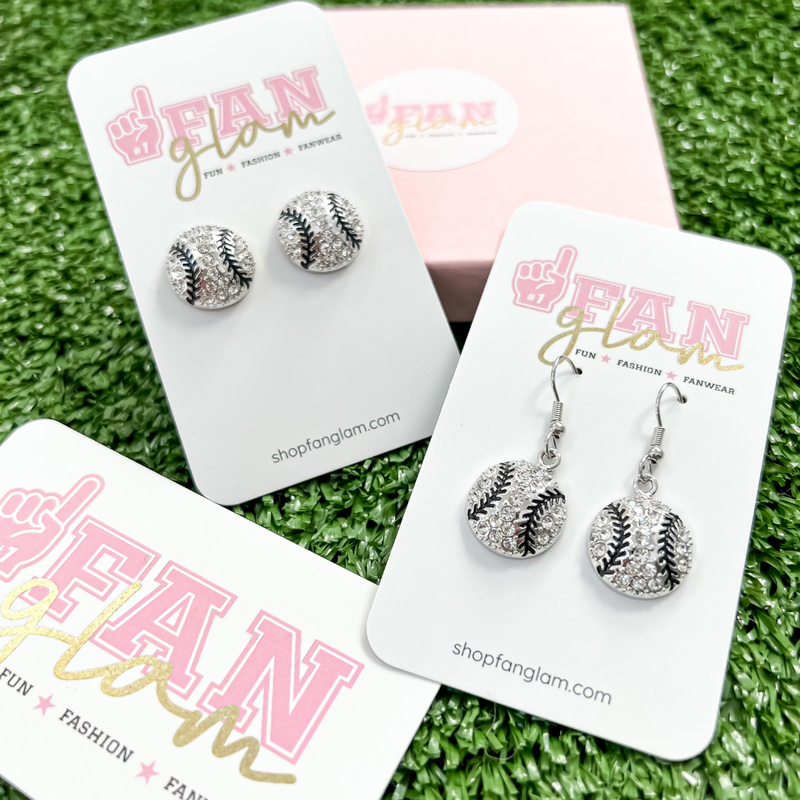 Show your love for the game when accessorizing your Ball Park look with our rhinestone studded baseball stud + dangle black stitched earrings!   The perfect accessory to coordinate with your GameDay ensemble.  