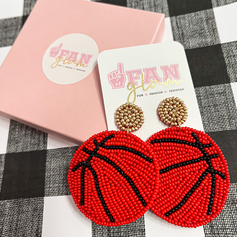 Show your love for the game when accessorizing your Game Day look with these uniquely beaded Basketball stud dangle earrings!   The perfect accessory to coordinate with your off-the-court ensemble.  
