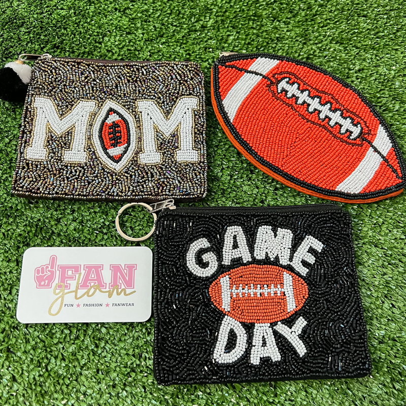 Show your love for GAME DAY, when you elevate your clear bag status and showcase one of our football beaded GAME DAY coin bags.    The perfect sized zip closure pouch to fit your cash, credit card, lipstick, keys + more!