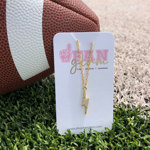 Lightning bolts symbolize power and light and we are excited to pair them with all our GameDay favorites.  Our Bolt Pendant Necklace is the perfect everyday go-to, and a great reminder you have all the strength you need within yourself.