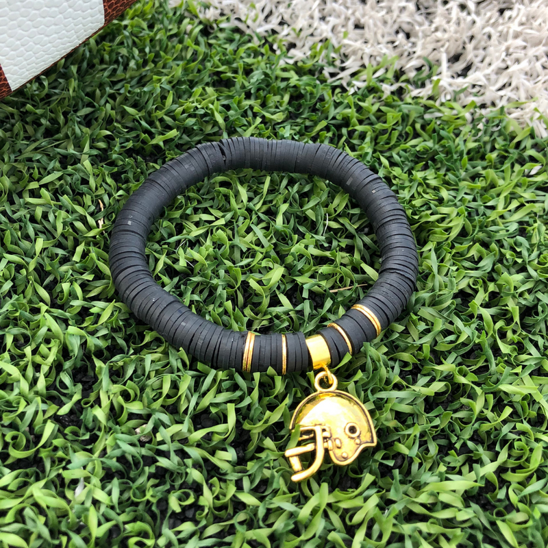 It's time to show off your football fan status with a one-of-a kind helmet charm bracelet designed just for you!  Showcase your love for the game and custom create your very own charm bracelet with your favorite team colors.