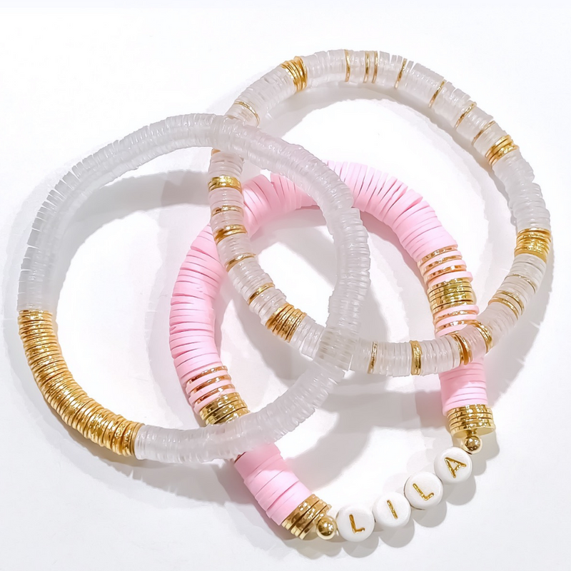 We are in LOVE!!  Introducing our NEW Clear + Gold 6mm Stacks!  The freshest twist on your GameDay stack.  Mix and match with any team color combo, its the perfect add on that goes with everything! 