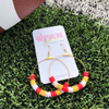 The Erika hoop earrings are a fun fan favorite.  Colorful yet playful, you will make a bold statement wearing these featherweight hoops when cheering in the stands.