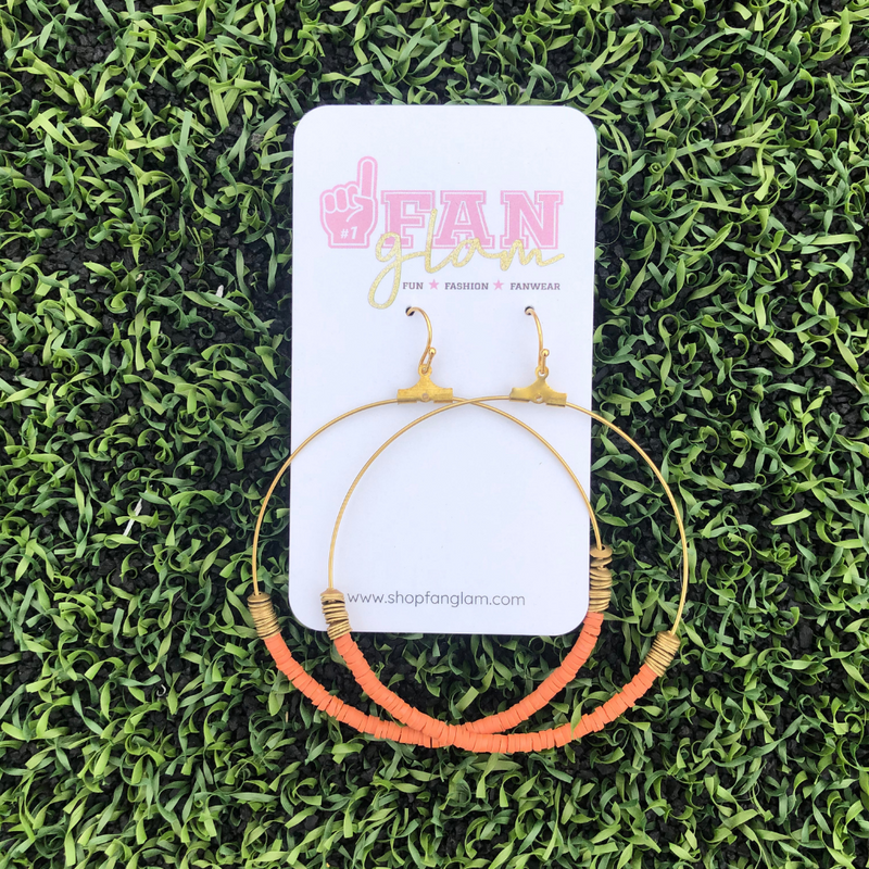 The Erika oversized hoop earrings are a fall favorite. Colorful yet playful, you will make a bold statement with these featherweight hoops when cheering in the stands.