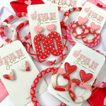 We are in LOVE!!!!  With Our NEW Fan GLAMentine's Tam Clay Co Sweet Heart Collection featuring fun new heart shapes and a mix of prints in pinks, reds and whites mixed with fabulous gold foil.