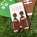 Show your love for the game when accessorizing your Game Day look with these uniquely beaded football stud earrings!   The perfect accessory to get you fired up for the playoffs this season!