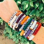You'll be the talk of the tailgate when you arrive wearing your Gameday Bracelet set!  Designed with all your favorite team's colors, it's the perfect arm stack to wear to the game this week.