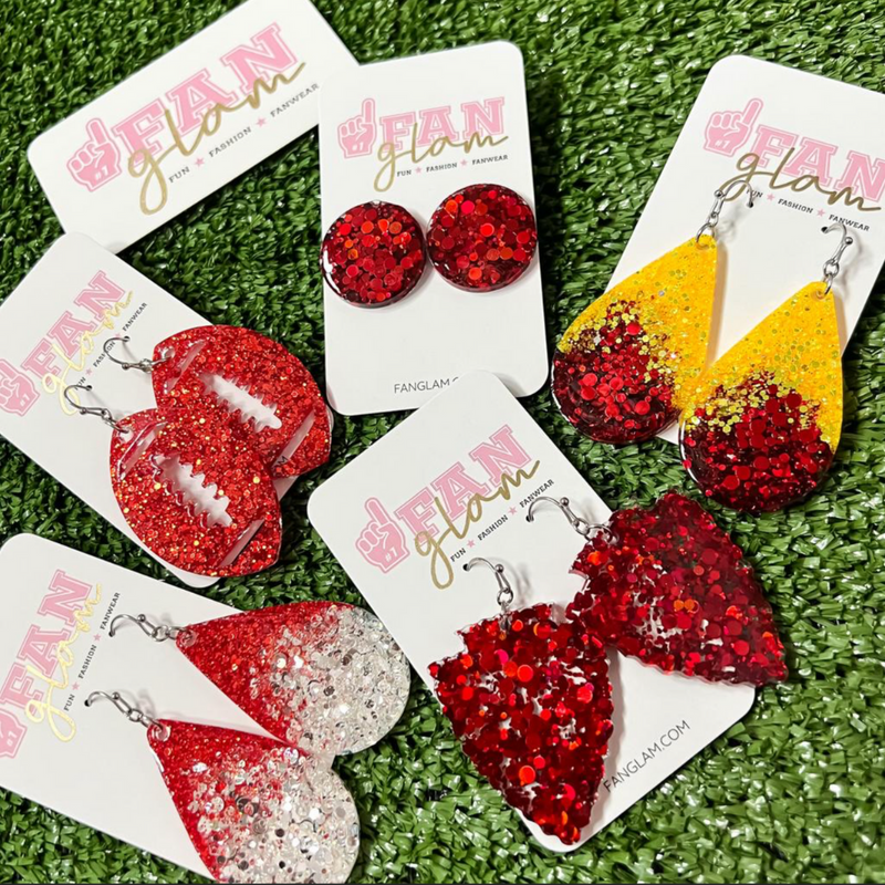 My new favorite go-to!  Our GameDay Glitter Glam Earrings are the perfect pop of color + glam for game time! Super lightweight and comfortable, you will forget you have them on.  Available in over a dozen fun colors, it's easy to mix and match all your favorite teams!
