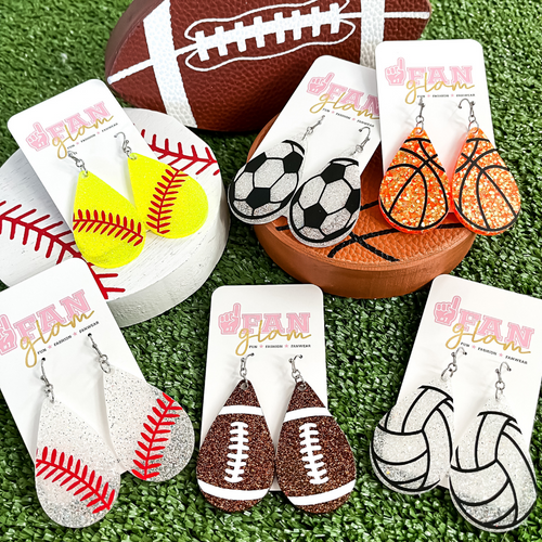 Glitter & Shine On The Sidelines When Wearing Our GameDay Glitter Glam Sports Ball Dangle earrings.  Sporty + Chic, They Will have You Ready For Game Time! Super lightweight and comfortable, you will forget you have them on.  Available in six different sports balls, they are easy to mix and match and to wear to all your favorite teams games!