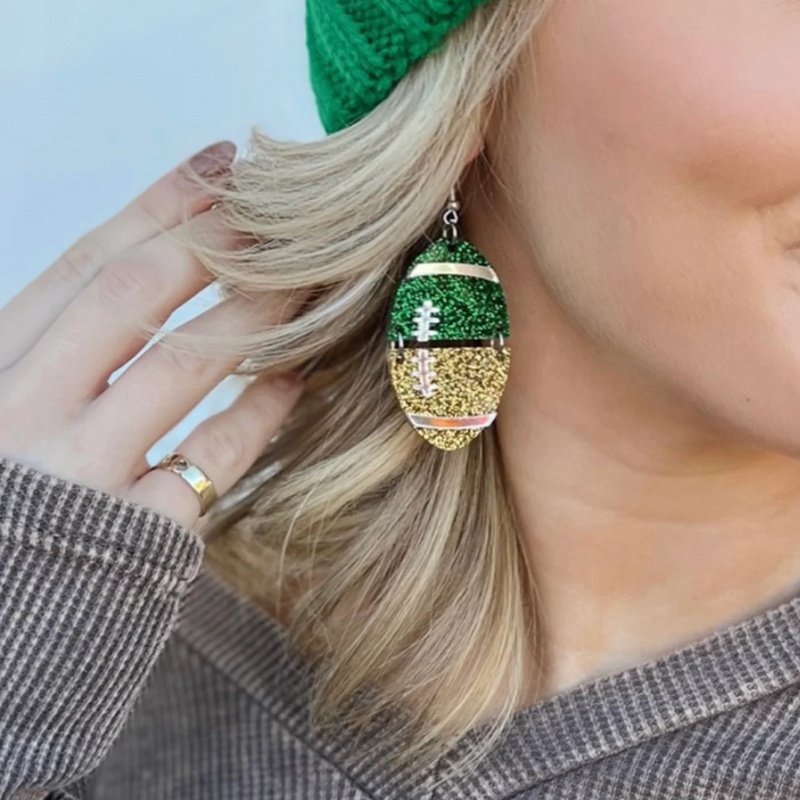 My new favorite go-to!  Our GameDay Green Bay Glitter Glam Earrings are the perfect pop of color + sparkle for game time! Super lightweight and comfortable, you will forget you have them on.  Available in over a dozen fun colors, it's easy to mix and match all your favorite teams!