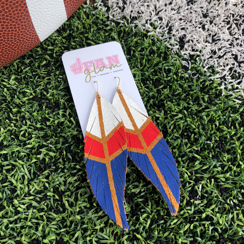 Stand out in the stands when wearing your favorite teams colors!  Our leather hand-painted trio colored feather earrings are the perfect accessory to coordinate your GameDay ensemble.  