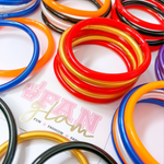 It's a good time to be Jelly...  Our new Game Day Jelly Bangles are the perfect pop of color to elevate your arm candy.  Level up your Game Day stack with a stack of 5 team colored sporty + chic jelly bracelets.  Mix and match with all your favorite team colors to create the perfect layering stack!