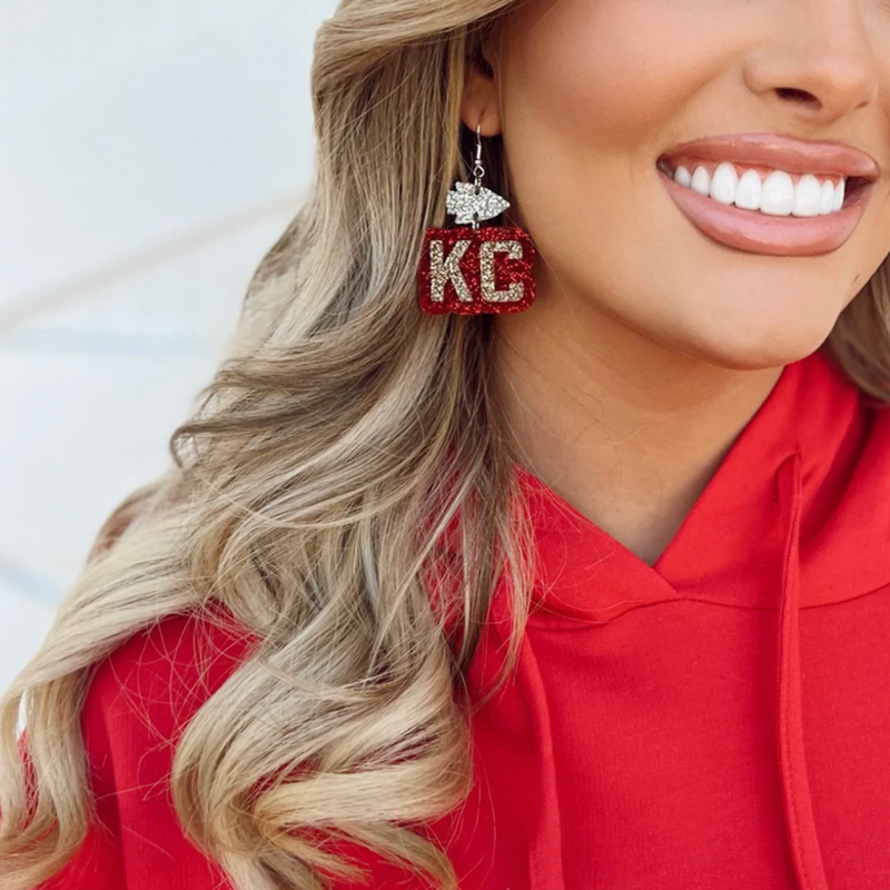 My new favorite Game Day go-to!  Our Game Day Kansas City Glitter Glam Earrings are the perfect pop of color + sparkle for game time! Super lightweight and comfortable, you'll forget you have them on.