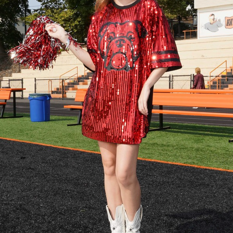 Sparkle and Shine It's Game Time!  Our NEW Gameday Sequin Bulldog dress will have you Game Time ready in no time.  Pairs perfectly with your favorite pair of white or black cowboy boots or when tailgate temperatures drop, add your favorite black leggings with booties or cute sneaks!