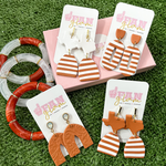 Our GameDay Tam Clay Co Burnt Orange Collection features three collectable styles, it's the perfect way to add team color and a fun pop of print to your gameday attire.  Be the talk of the stands when you arrive wearing these stunning, one-of-a-kind pieces of Glam ear art!