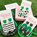 Our GameDay Tam Clay Co Green Collection is the perfect way to add your favorite teams colors along with a fun pop of print to your gameday attire.