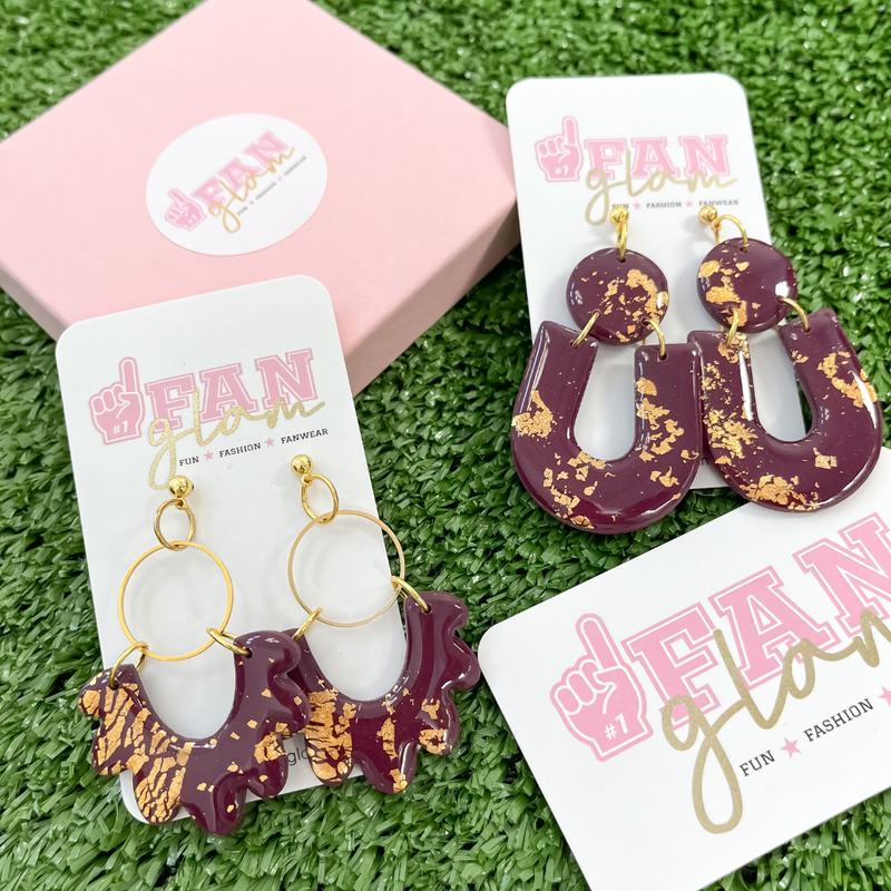 Our GameDay Tam Clay Co Maroon & Gold Fleck Collection features two fun new designs. It's the perfect ear candy for your day-to-GameDay attire!  Styles Featured From Left To Right - Christy $26 and Michelle $28