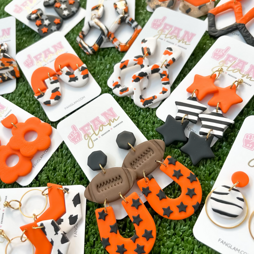 New Year = New Glam!  Our NEW GameDay Tam Clay Co Orange Collection features SO many new collectable styles, it's the perfect way to add team color and a fun pop of print to your gameday attire.  Be the talk of the stands when you arrive wearing these stunning, one-of-a-kind pieces of Glam ear art - collect all five, your jewelry box will love you for it!