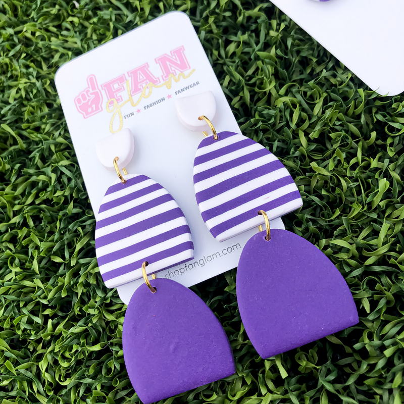 Get ready for this weeks game with our Tam Clay Co Purple Collection!  It's the perfect way to add a pop of color to your game day attire.  Be the talk of the stands when you arrive wearing these stunning, one-of-a-kind pieces of Glam ear art - collect all four, your jewelry box will love you for it!
