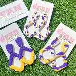 Get ready for this weeks game with our GameDay Tam Clay Co Purple + Yellow Collection!  It's the perfect way to add a pop of color and fun print to your game day attire.