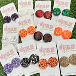 My new favorite go-to!  Our GameDay Glitter Glam Round Stud Earrings are the perfect pop of color + glam for game time! Super lightweight and comfortable, you will forget you have them on.  Available in over a dozen fun colors, it's easy to mix and match all your favorite teams!