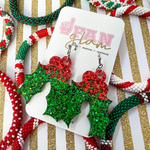 Our Holiday Glitter Glam Dangle earrings are the perfect combination of bright colors, fun prints, and holiday designs that bring cheer!   Available in an array of colors and styles, you can pick and choose all your favorites.  The perfect Secret Santa Gift for all your besties!