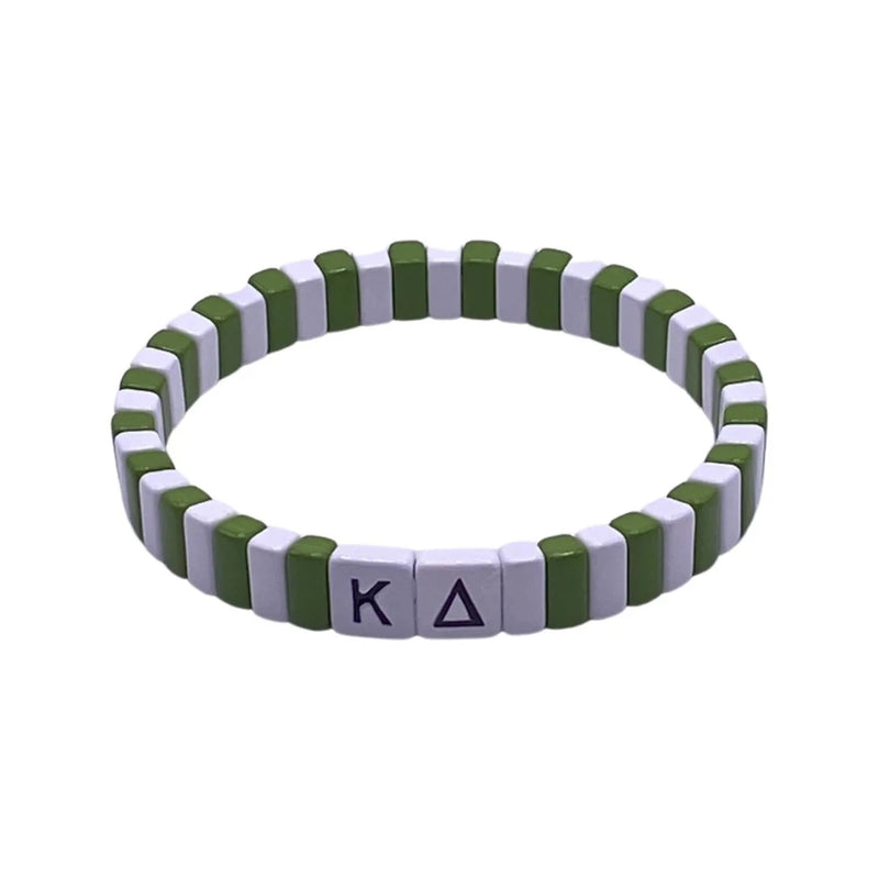 We've Got Your Sorority STACKED! Our exclusive enamel tiled stacks makes the perfect day-to-gameday accessory that embraces your sisterhood camaraderie and takes your arm candy to the next level. GLAM it up in the stands with the best college jewelry around!