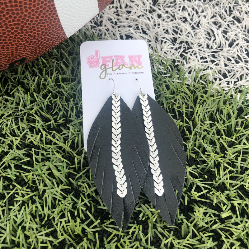 Lovely Lady Luxe!  Our black leather feather stunners just got glammed!  The stunning Lena Silver Chain black and silver leather beauties feature a unique arrow design.  A one-of-a-kind look to add a fun "Glam" pop to your GameDay style!