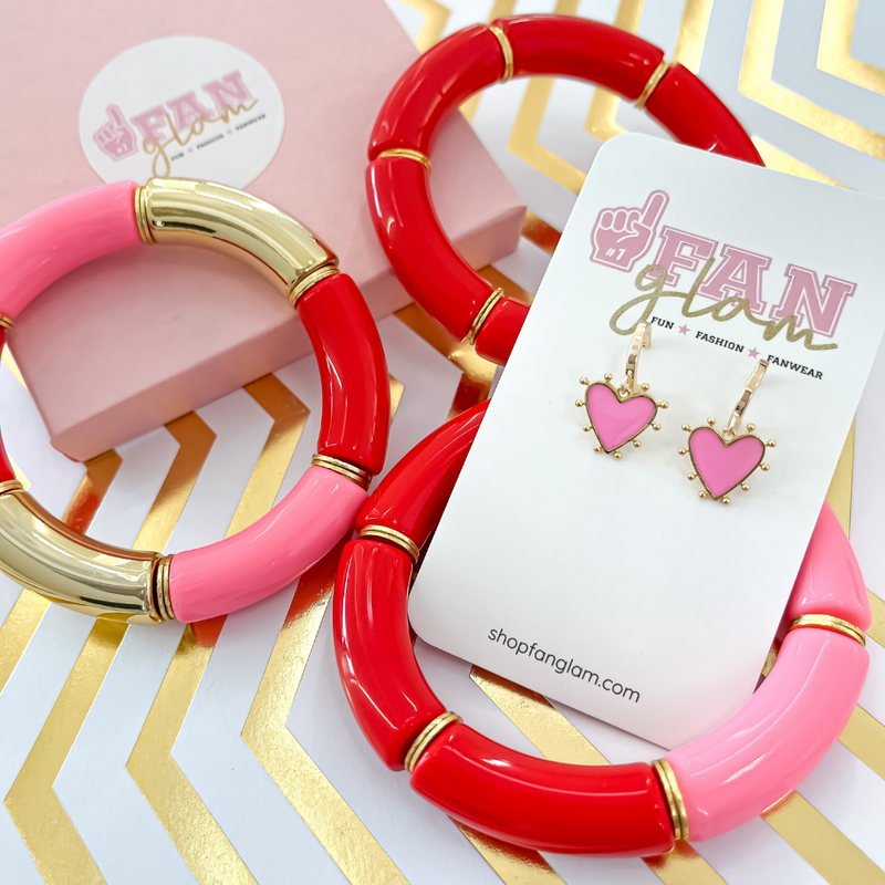 Dainty and sweet, our Love Bug Heart Huggies are the perfect pop of color to your everyday glam.  Stack them with your favorite hoops or pair them with your personalized initial studs. 