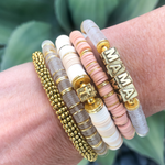 We are in LOVE!!  Introducing our NEW MAMA Block Letter Clear + Gold 6mm Stacks!  The freshest twist on your GameDay stack.  Mix and match with any team color combo, its the perfect add on that goes with everything! 