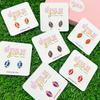 It's time to get ready for kick-off!  Show off your football fan status by accessorizing your Game Day look with our brand new team colored football stud earrings!   Available in 7 versatile color ways you can mix and match with all your stadium looks!