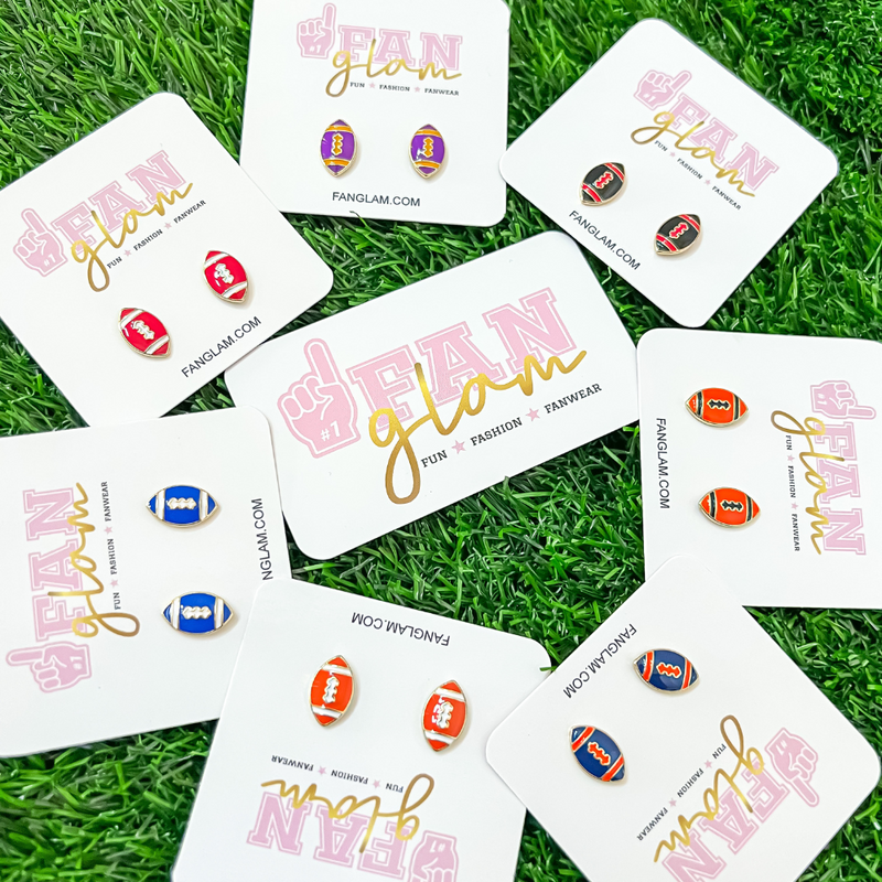 It's time to get ready for kick-off!  Show off your football fan status by accessorizing your Game Day look with our brand new team colored football stud earrings!   Available in 7 versatile color ways you can mix and match with all your stadium looks!