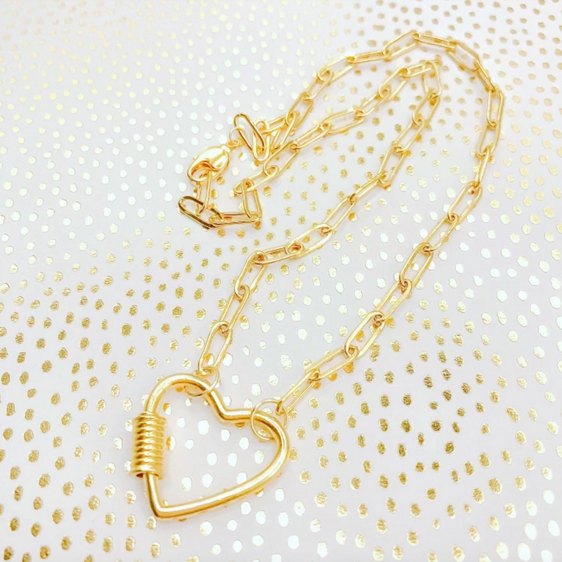 Our 16k gold plated chain link necklace features a unique open heart design with a fun coiled twist. It's the perfect gift to show your love for someone close, or to show-off your love of the game.