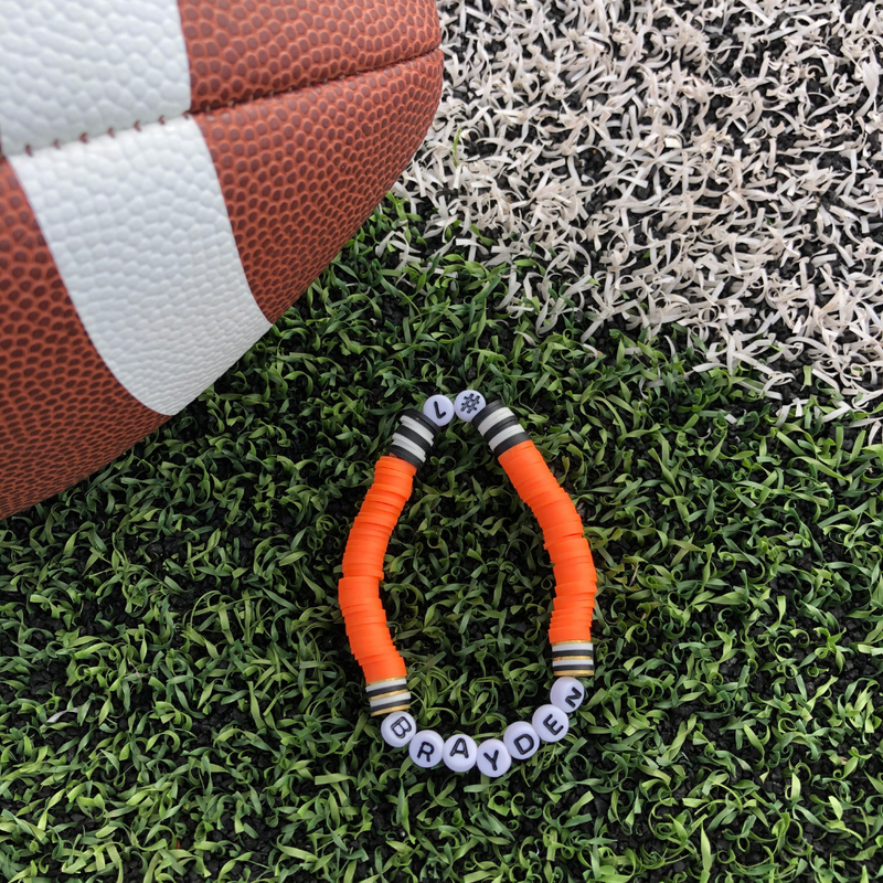Show off your team spirit by creating a one-of-a-kind player bracelet featuring your STAR player!     Our "Player # Bracelet" gives you the custom personalization that's hard to find in a variety of team colors. 