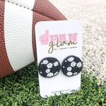 Show your love for the game when accessorizing your Game Day look with these uniquely beaded Soccer Ball stud earrings!   The perfect accessory to coordinate with your sideline ensemble.    Model Is Wearing Our 1"X1" Beaded Soccer Ball Stud Earrings for $20