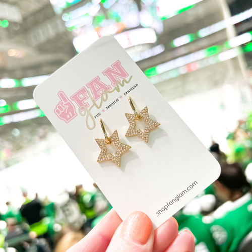 A Star is Born... Be the star of the game when sporting our Star Rhinestone Studded dangle earrings.  Designed to integrate and compliment all your game day looks.