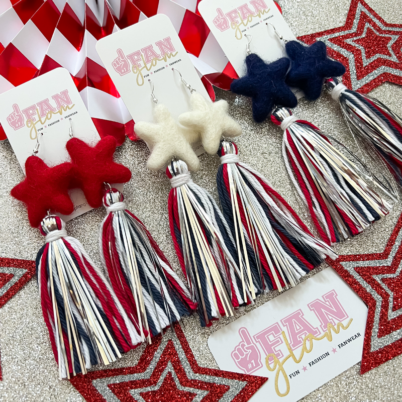 Nothing says Red White and Blue more than our Star Tinsel POM POM Fringe earrings.  Our curated trio collection of patriotic colors,  Red, White and Classic Blue are a great staple for your Game Day ensemble and all your festive holiday celebrations.