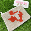 Show your love for Texas, when you elevate your Game Day clear bag status and showcase this adorable beaded State of Texas coin purse featuring our iconic longhorns. 