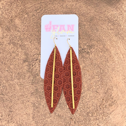 Fan Glam's hand cut leather embossed HoneyComb Stix earrings are the perfect day-to-game earrings. Available in an array of rich color tones all featuring a gold brass bar.