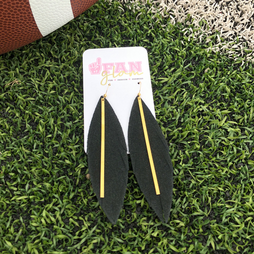 Add a little boho flair to your GameDay style when sporting these fabulous suede leather stunners, featuring a golden brass bar. 