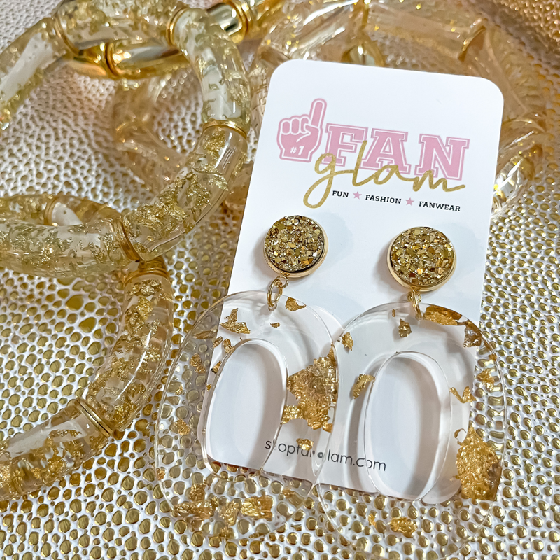 Add a little sparkle and shine to your jewelry box with our super Classy + Chic Gold Fleck Stud Dangle Earrings.  It's the perfect everyday dangle!