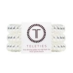 TELETIES - CRYSTAL CLEAR  Hold your hair and enhance your style with TELETIES. The strong grip, no rip hair tie that doubles as a bracelet. Strong, pretty and stylish, TELETIES are designed to withstand everyday demands while taking your look to the next level.