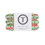 TELETIES - HOLIDAY HOOPLA  Hold your hair and enhance your holiday style with TELETIES. The strong grip, no rip hair tie that doubles as a bracelet. Strong, pretty and stylish, TELETIES are designed to withstand everyday demands while taking your look to the next level.