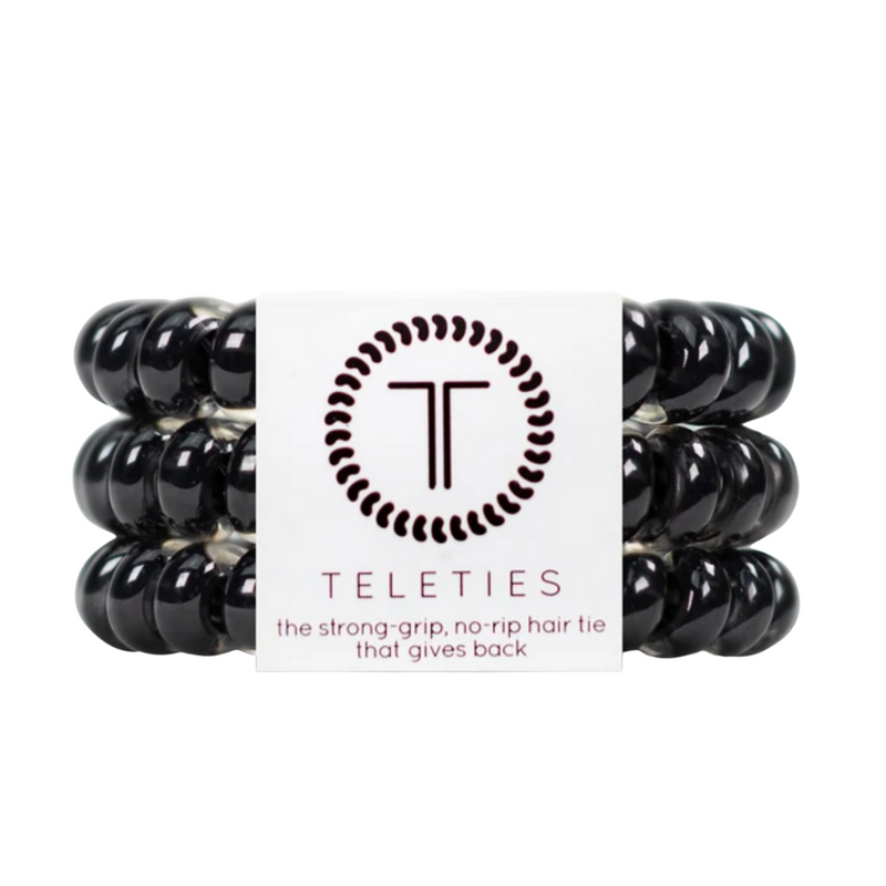 TELETIES - JET BLACK  Hold your hair and enhance your style with TELETIES. The strong grip, no rip hair tie that doubles as a bracelet. Strong, pretty and stylish, TELETIES are designed to withstand everyday demands while taking your look to the next level.