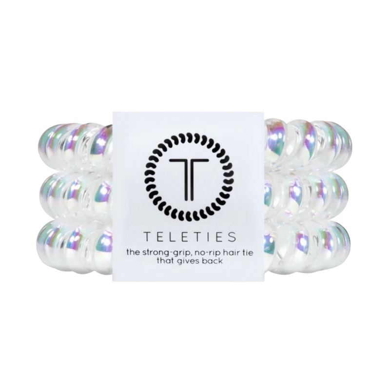 TELETIES - PEPPERMINT  Hold your hair and enhance your style with TELETIES. The strong grip, no rip hair tie that doubles as a bracelet. Strong, pretty and stylish, TELETIES are designed to withstand everyday demands while taking your look to the next level.
