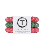 TELETIES - SANTA PAWS  Hold your hair and enhance your holiday style with TELETIES. The strong grip, no rip hair tie that doubles as a bracelet. Strong, pretty and stylish, TELETIES are designed to withstand everyday demands while taking your look to the next level.