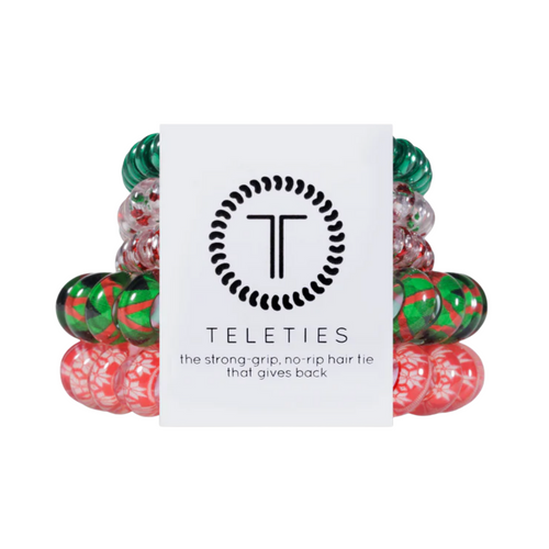 TELETIES - YULETIDE MAGIC  Hold your hair and enhance your holiday style with TELETIES. The strong grip, no rip hair tie that doubles as a bracelet. Strong, pretty and stylish, TELETIES are designed to withstand everyday demands while taking your look to the next level.  This five pack includes 3 smalls and 2 large Teleties